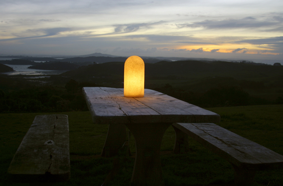 column stone garden light on table lit